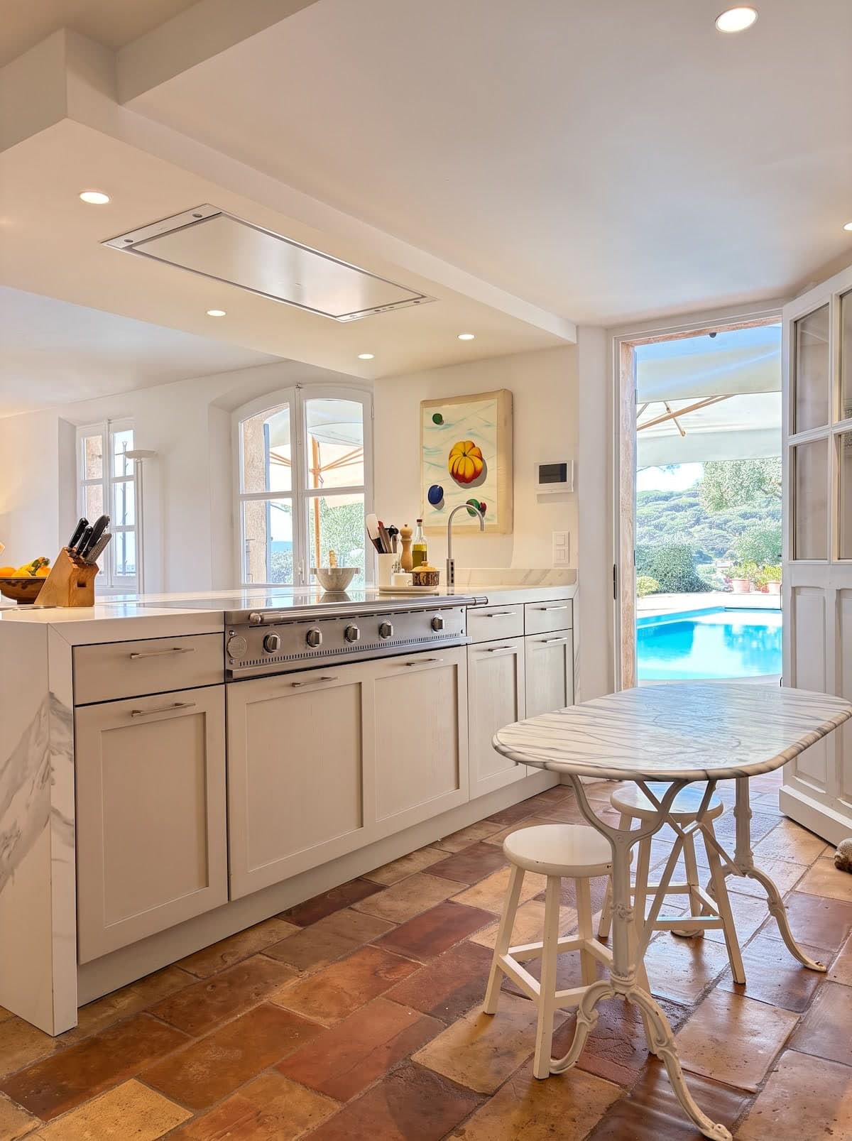 Chef kitchen with La Cornue induction range and V-ZUG appliances, view 1 of 9.