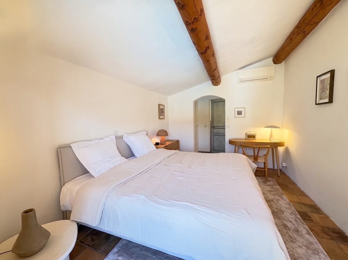 Rochers Bedroom, the king guest room in the pool-side wing, view 1 of 7.